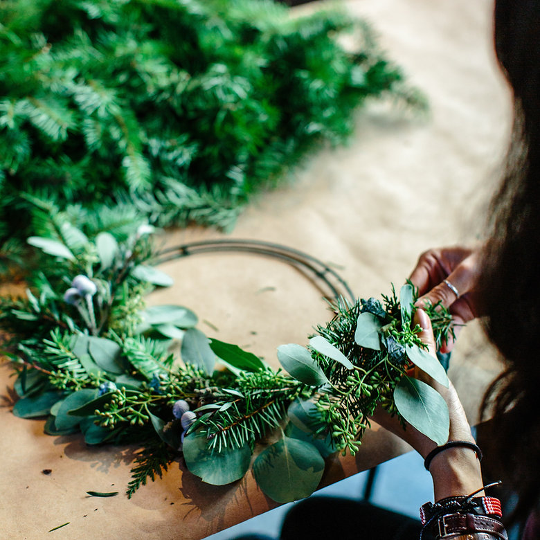Person making a Wreath Person making a Wreath